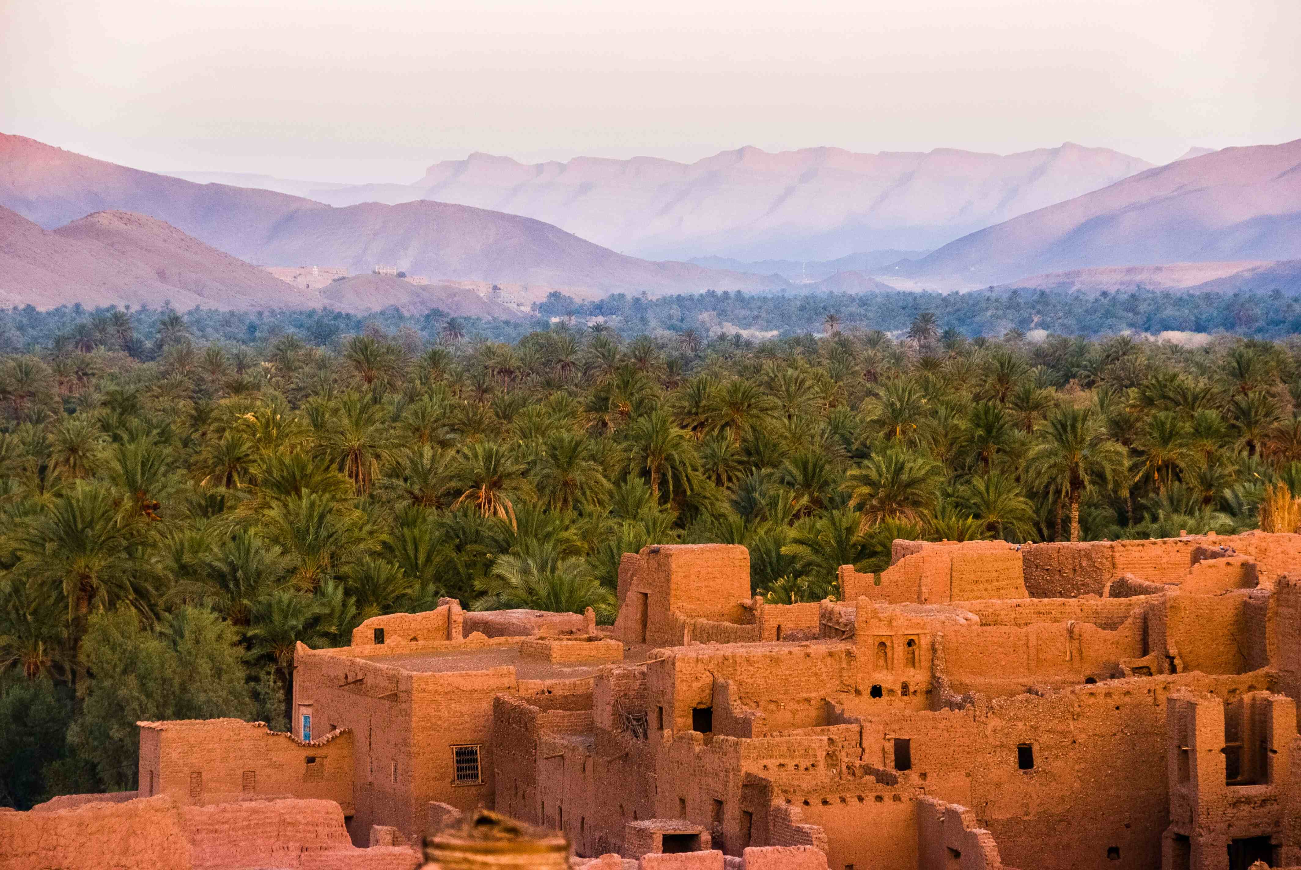 Sunset over Sahara Desert dunes in Morocco